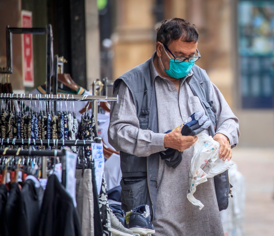 A man wearing a mask in Bradford, West Yorkshire