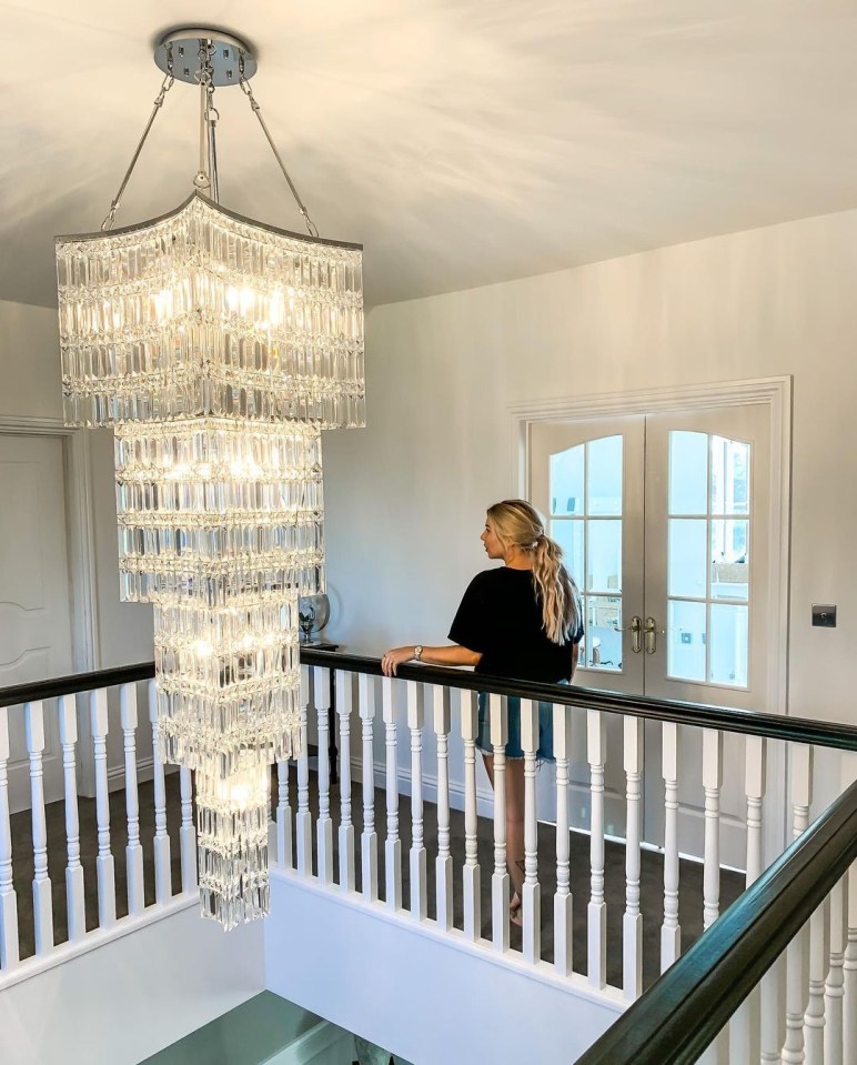  There is a huge chandelier in the hallway