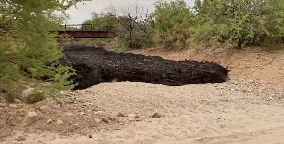 The river of sludge was made up of ash and other debris following wildfires in the area