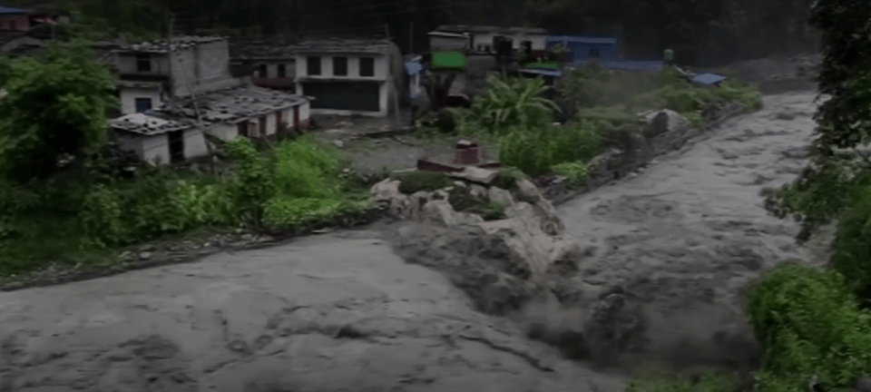 The overflowing Brahmaputra River flows through China’s Tibet, India and Bangladesh