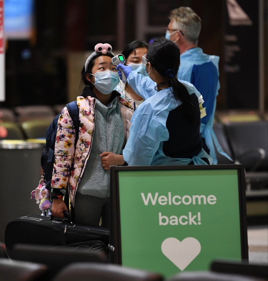 Passengers arrive on a Qantas flight from Melbourne to Sydney Airport