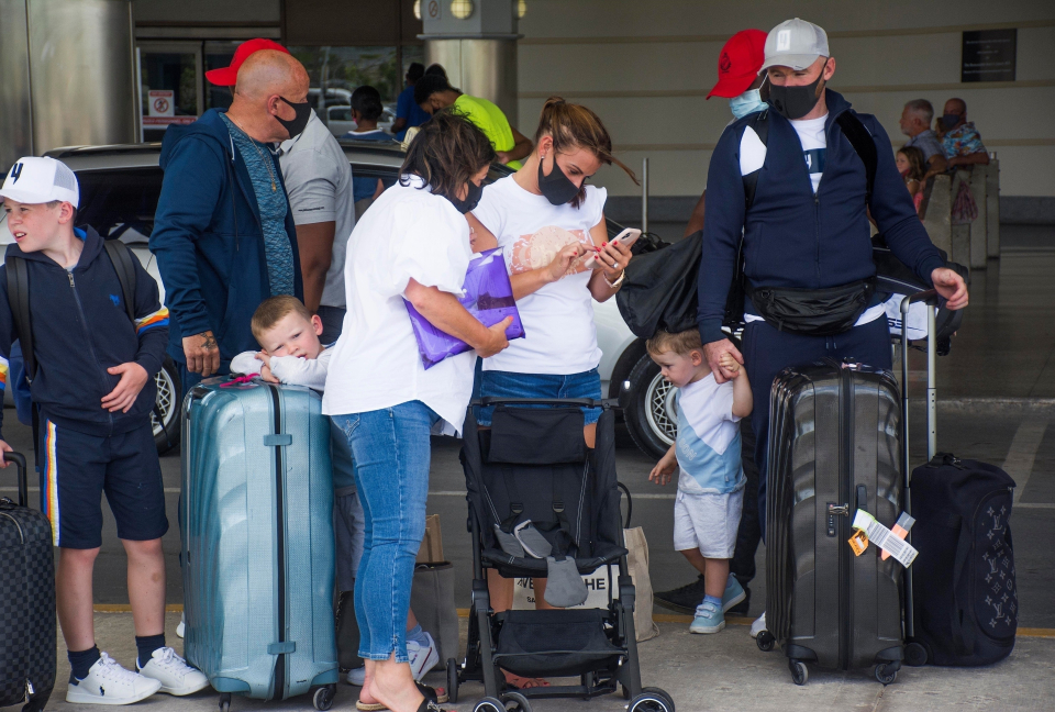 Wayne, Coleen and their four sons Kai, 10, Klay, 7, Cass, 2, and Kit, 4, were pictured at the airport with ten huge suitcases