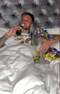 Liam Cooper was pictured at 5am holding the Championship title