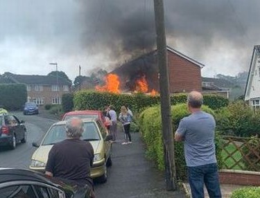 Neighbours came out of their homes after hearing an explosion followed by a second even louder explosion