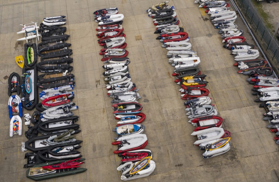 A storage yard for the dinghies, ribs and rowing boats previously used by migrants to cross the English Channel from France 