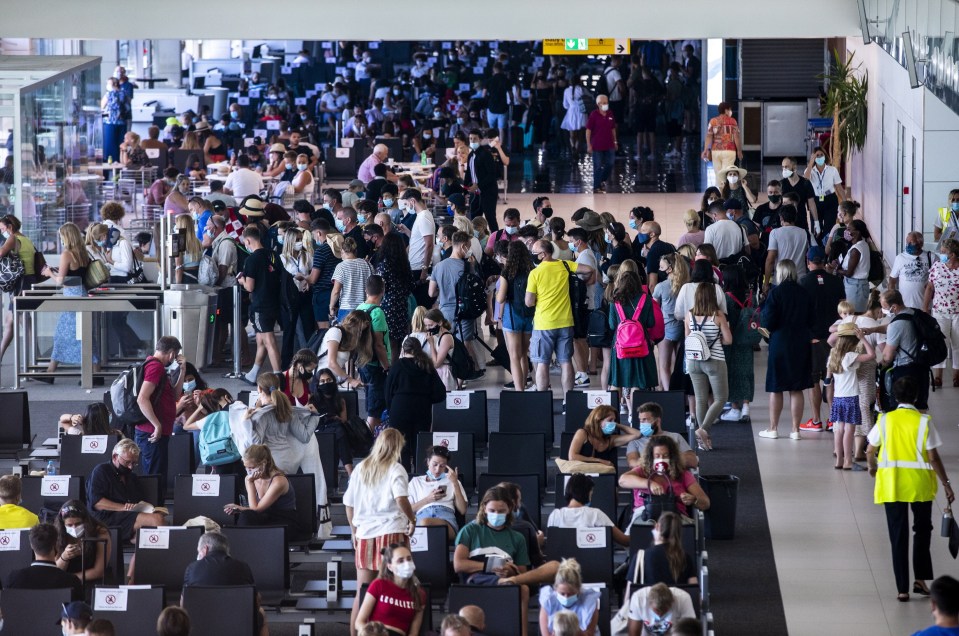 Holidaymakers pack out the departure lounge at Split Airport in Croatia