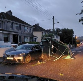 A trampoline has been swept onto a public road from galeforce winds during storm Ellen