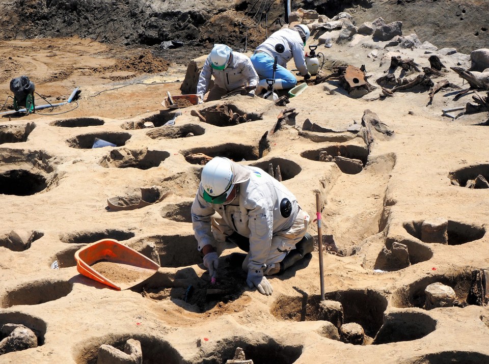 Each grave contained several bodies