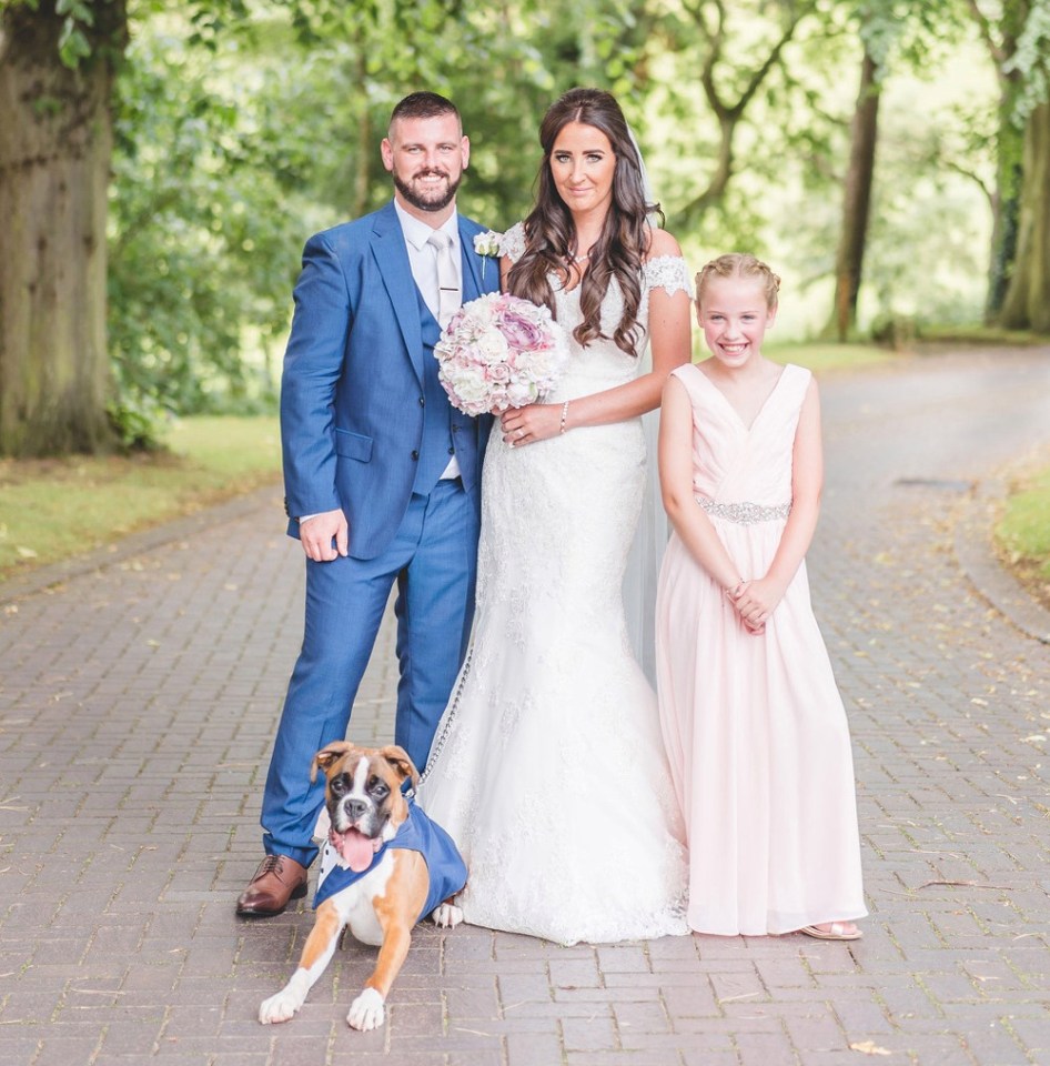 Gemma and Kyle with Grace on their wedding day