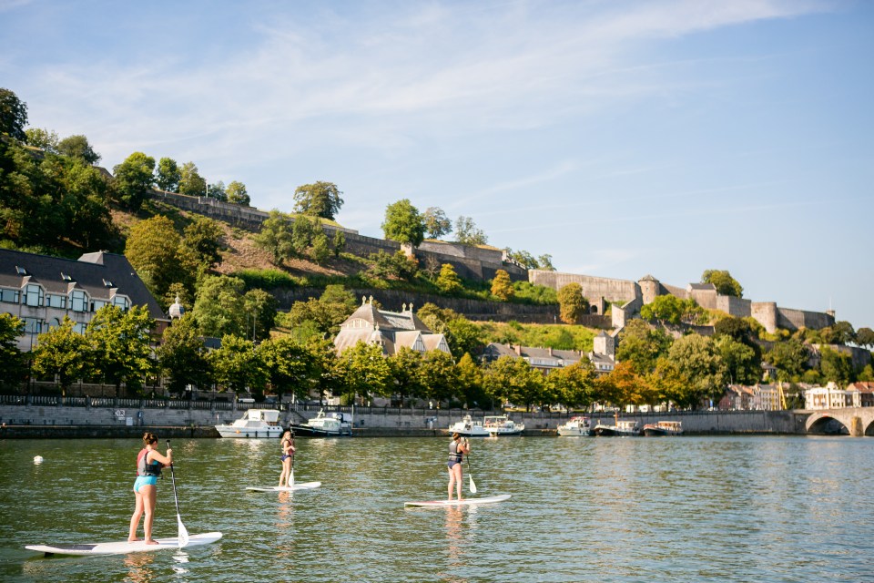 Soak in the beautiful views as you hop on a paddle board or in a kayak from Les Capitaineries to paddle around islets in the Meuse river