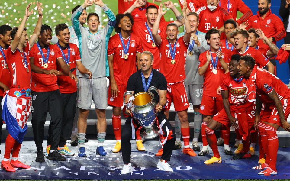 Bayern boss Hansi Flick celebrates with the Champions League trophy 