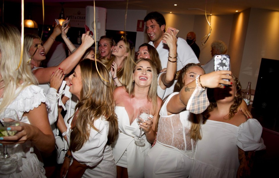 Former TOWIE star James Argent was surrounded by several women as he performed in Malaga