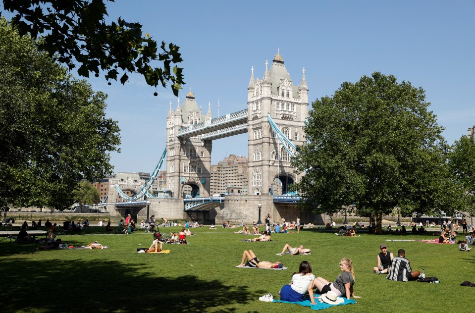 Londoners enjoy the sunshine in Potters Fields Park on Friday