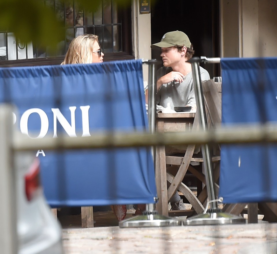 The couple looked deep in conversation on their latest date