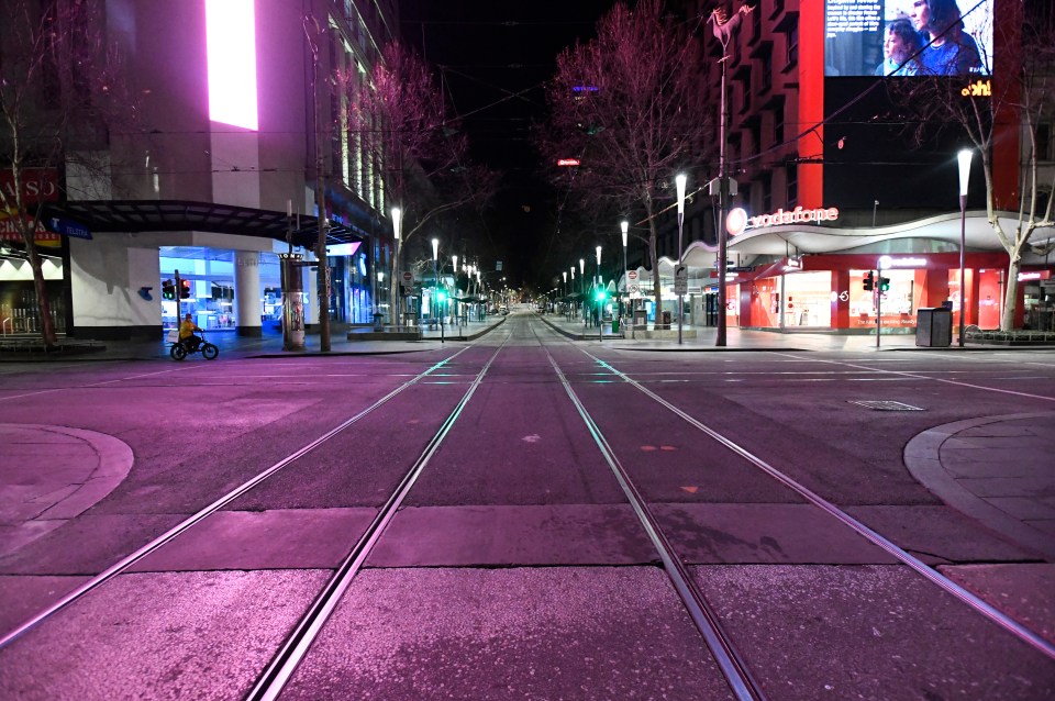 The streets of Melbourne stand eerily empty last night