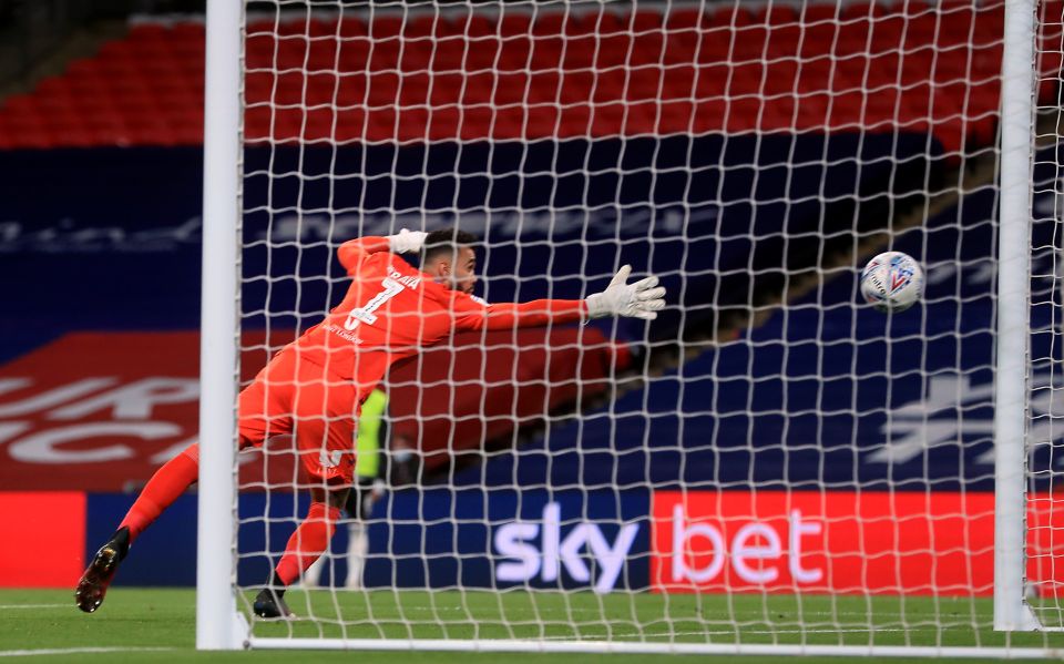 Brentford goalkeeper David Raya could only scramble across his goal in vain as Bryan's long-range effort hit the back of the net