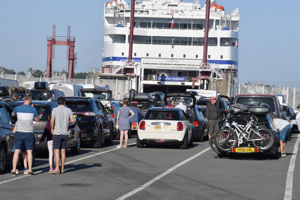 Tourists seen packing up the car at St Malo waiting to catch the ferry