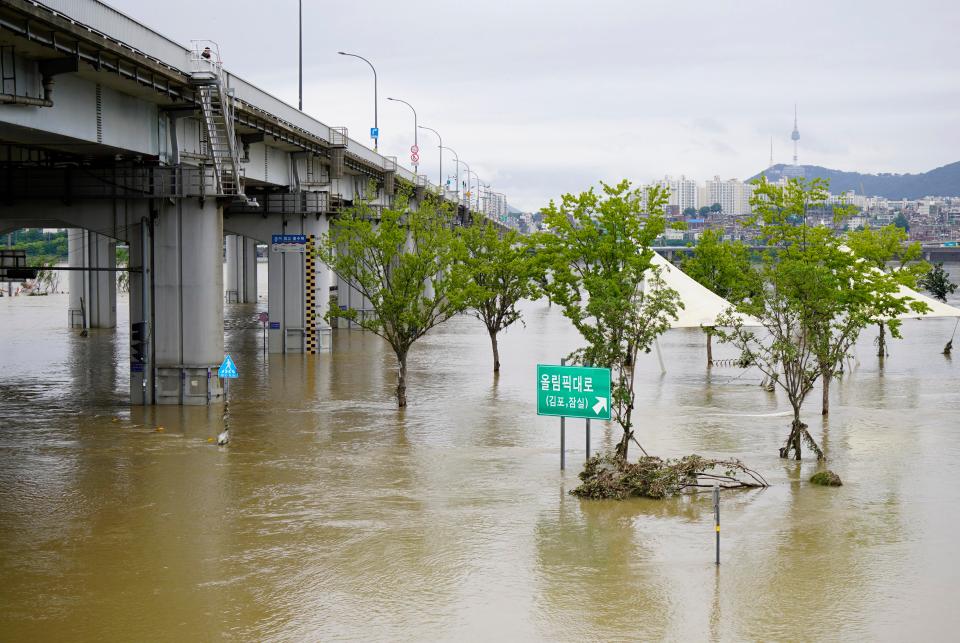 A flooded street is seen at Han river park in Seoul