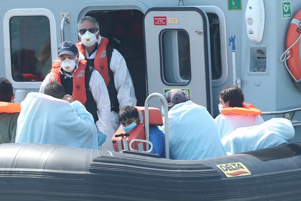 Border Force crew, pictured, were seen bringing a group of migrants into Dover