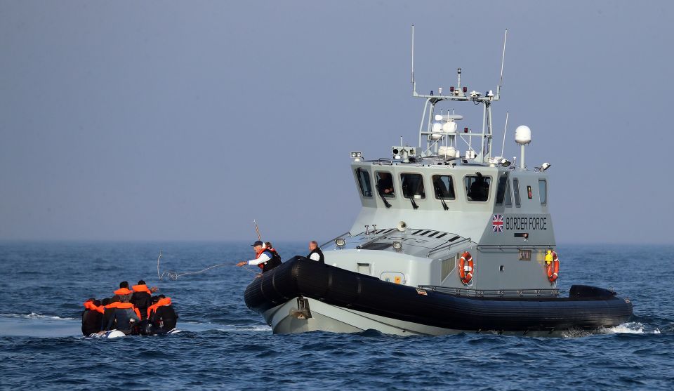 Border Force officers assist 20 Syrian migrants aboard Border Force vessel HMC Hunter off the coast of Dover