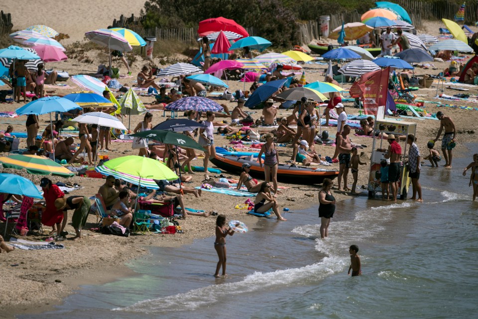 Holidaymakers in Bormes-les-Mimosas in southern France have enjoyed the hot weather this week