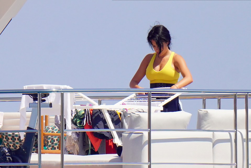 Georgina Rodriguez was left to sort the holiday washing aboard the yacht