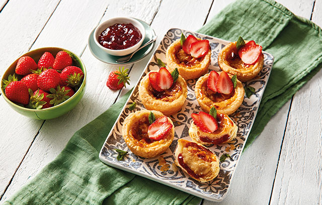 These strawberry Portuguese tarts are a summery fusion of Portuguese and British flavours