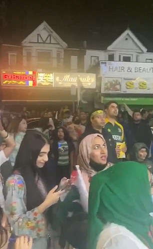 Hundreds of partygoers flooded Manchester's Curry Mile