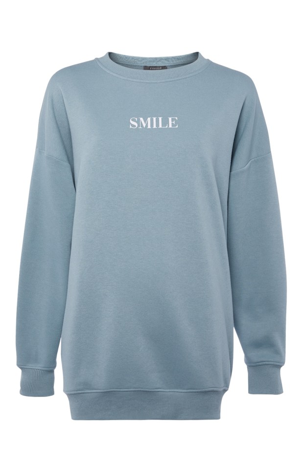 Stacey's blue loungewear has the word 'smile' on the front and costs £12 for the top and £12 for the bottoms