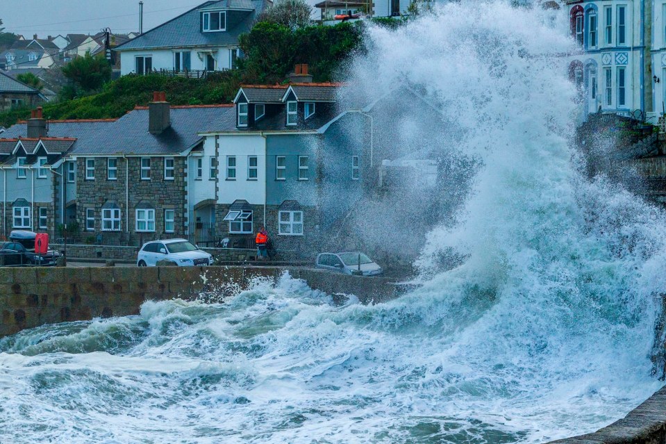 Storm Ellen hits Porthleven in Cornwall bringing high winds and mountainous waves