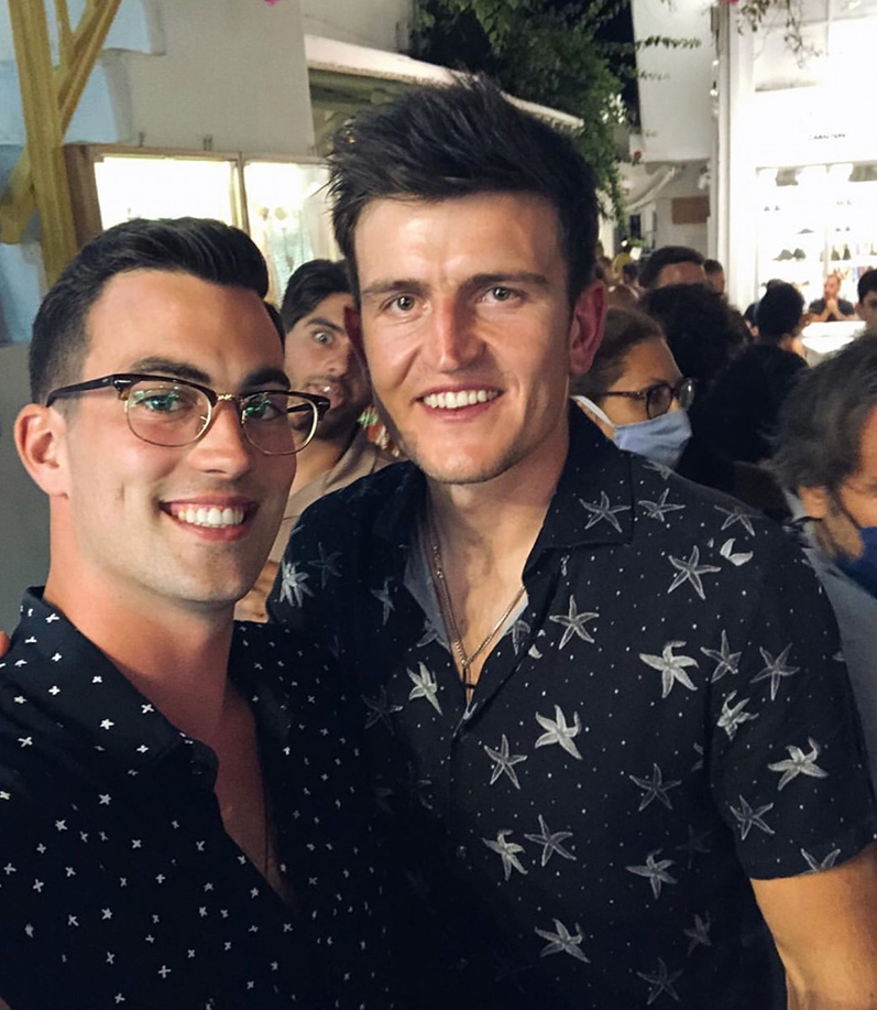 Maguire poses with a fan on Wednesday night