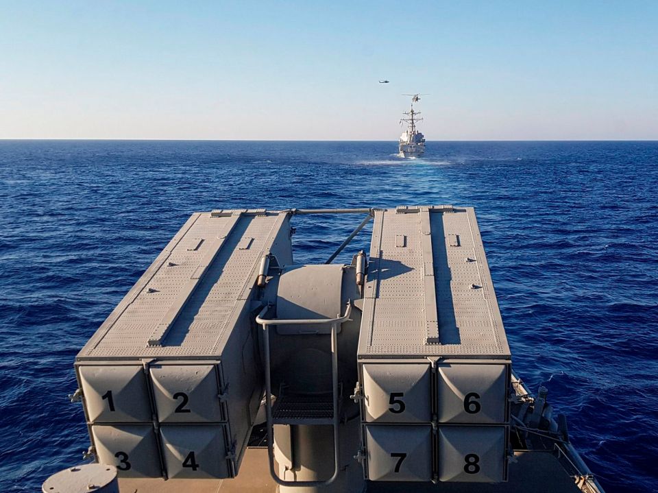 Vessels and helicopters take part in a Greek-US military exercise in the eastern Mediterranean sea south of Crete on Monday