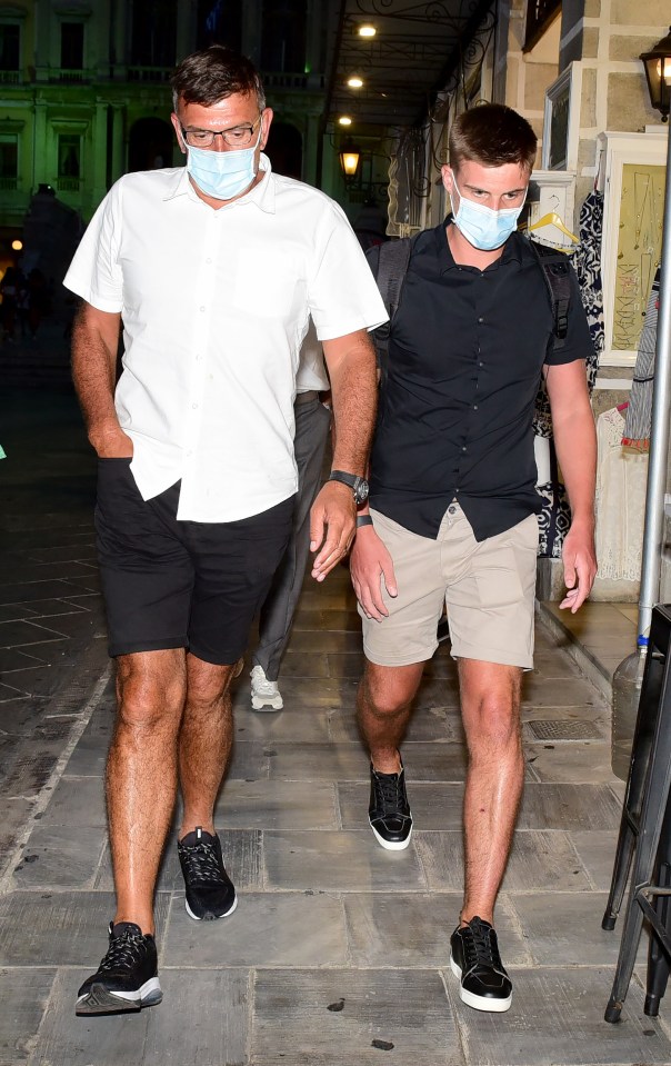 Ashden Morley with Harry Maguire's dad, Alan Maguire, (white shirt) leaving the Syros town Hall