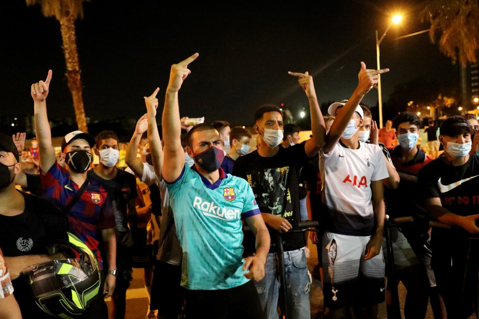 Fans - plus one Tottenham supporter - directed their anger with finger gestures aimed at the stadium