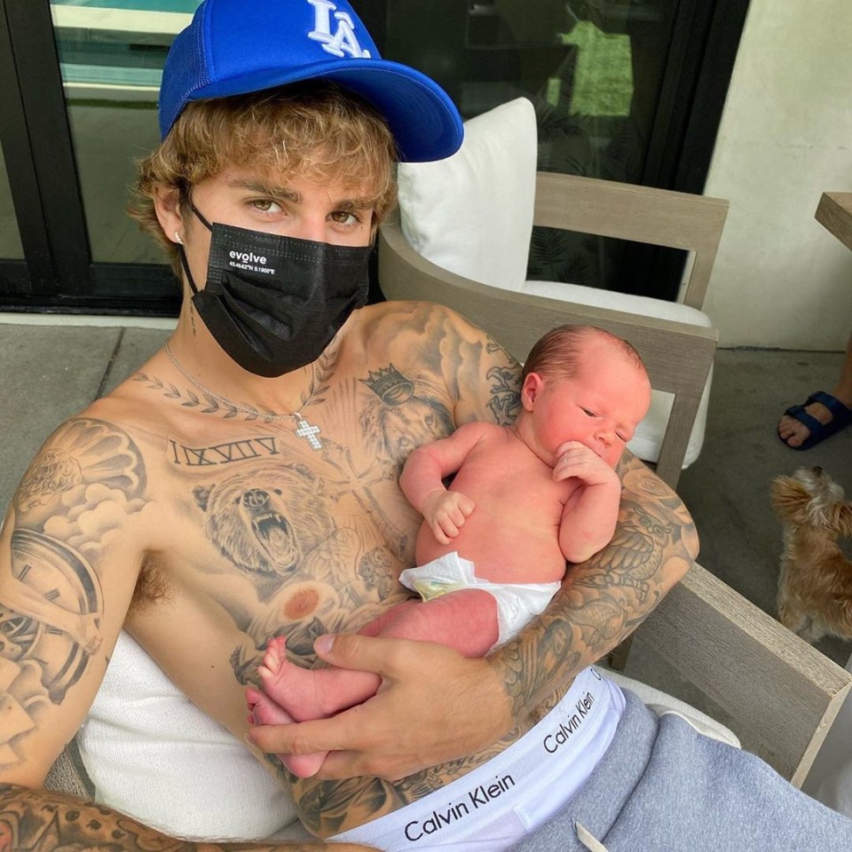 Justin Bieber made women broody when he posted a picture of himself holding his baby niece while topless