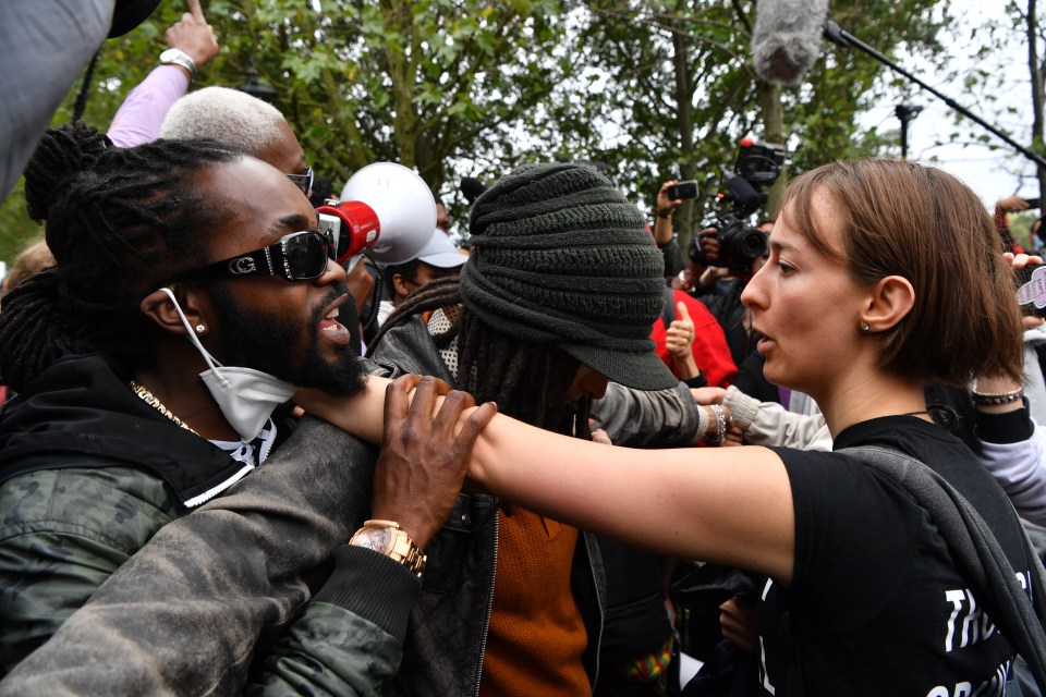 Million People March demonstrators remonstrate with Speakers Corners groups at Hyde Park