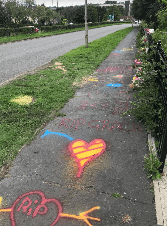 Tributes have been painted at the scene of the devastating crash