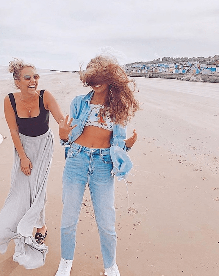 Lydia and Romana frolic on the beautiful Camber Sands beach