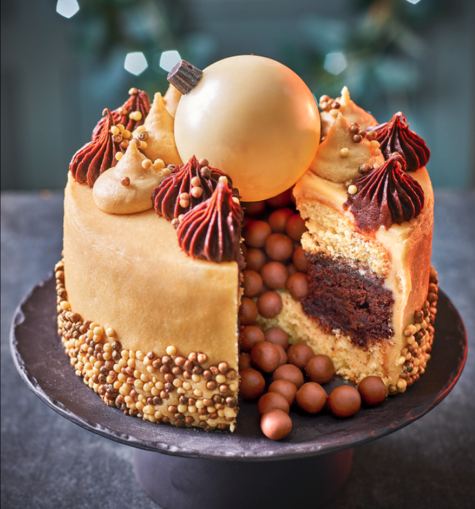 This pretty looking cake is decorated with a large white chocolate bauble 