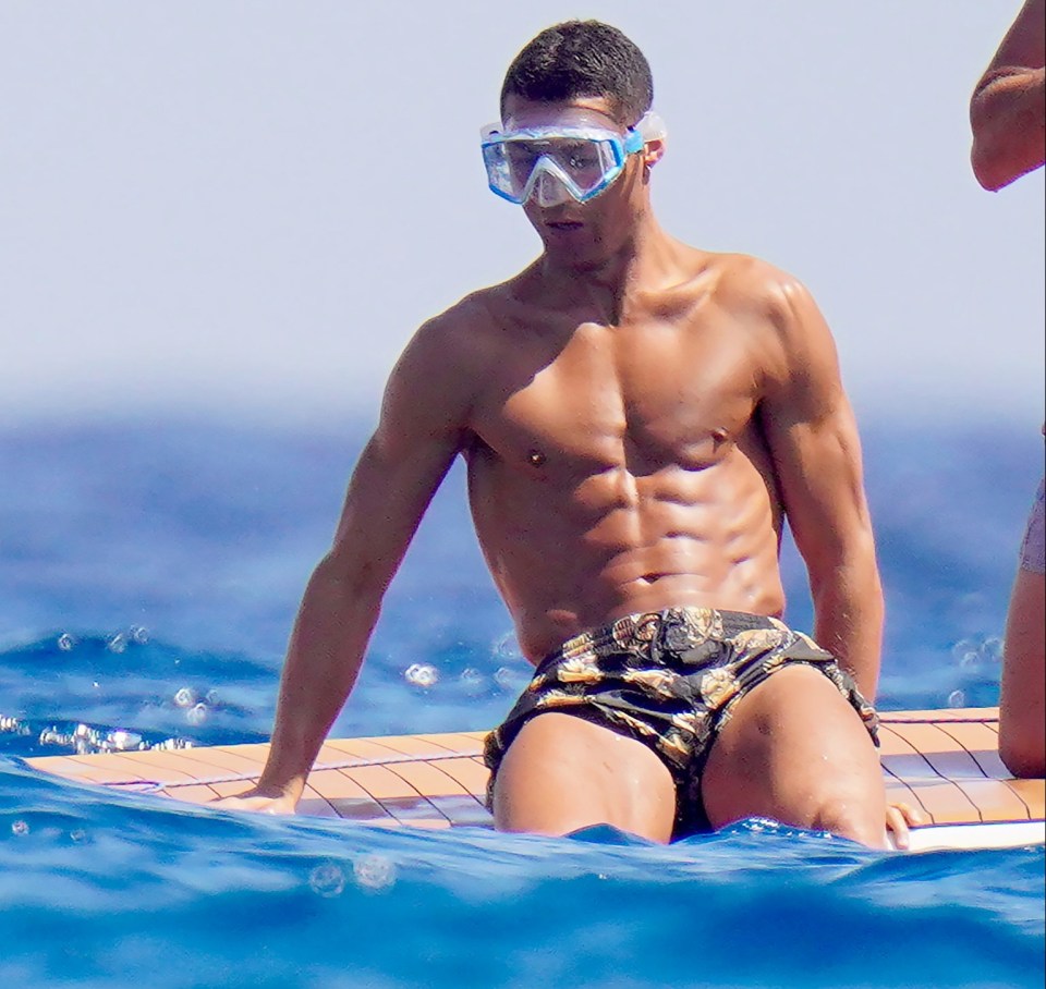 Ronaldo strapped on some snorkelling goggles as he prepared to go for a dip