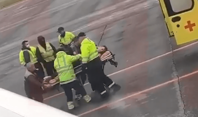 Video shows Navalny, 44, an anti-corruption campaigner, being stretchered from the aircraft to a waiting ambulance in the Siberian city of Omsk