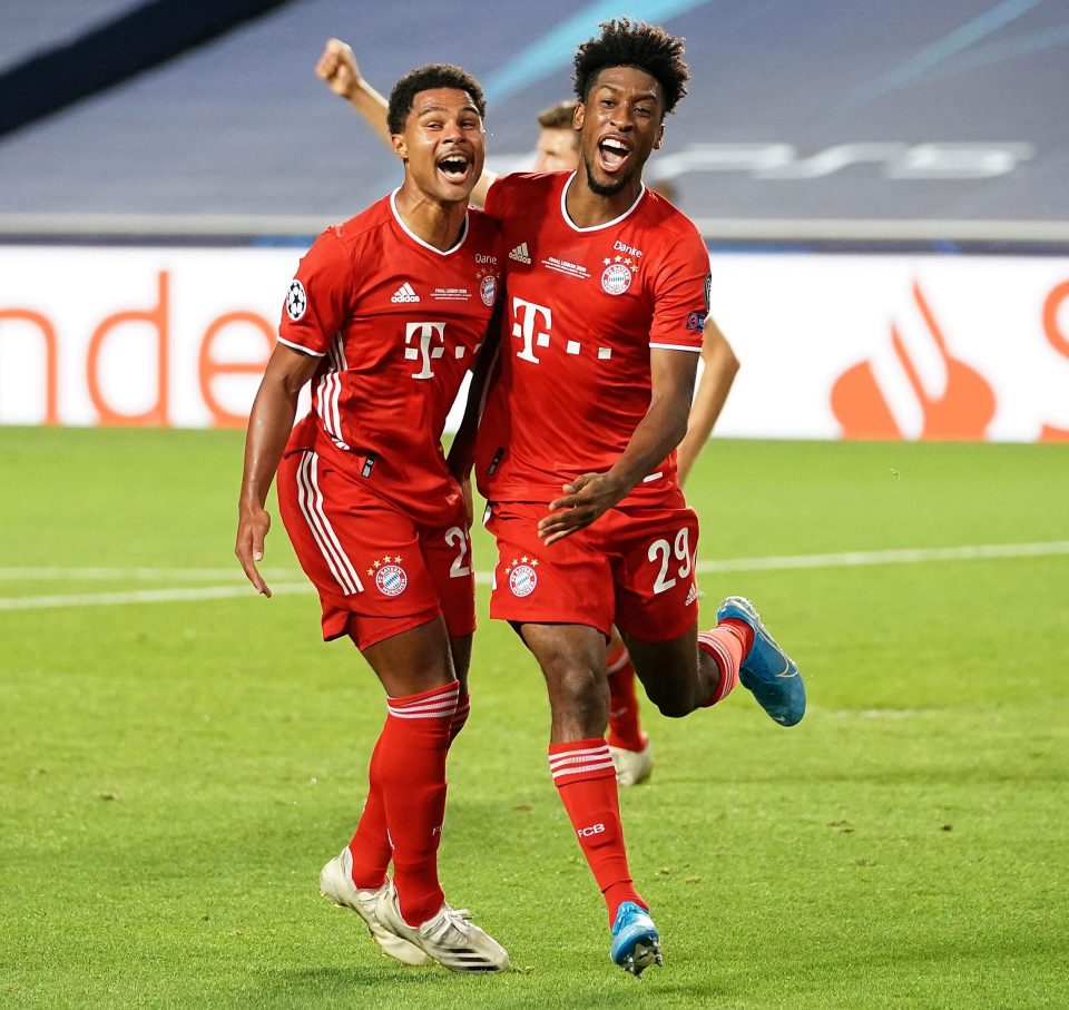 Serge Gnabry celebrates with attacking team-mate Coman 