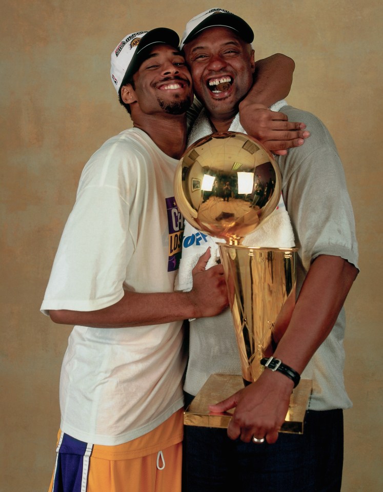 Kobe poses with proud dad Joe after winning the NBA Championship at the Staples Center in LA, California, in June 2000