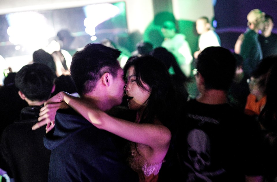 Two clubbers get close in Wuhan