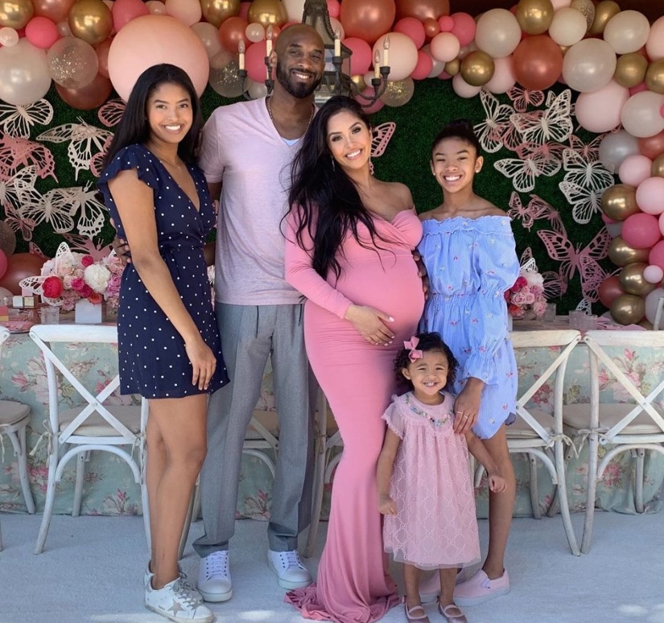 Kobe Bryant and his wife Vanessa, then pregnant with their fourth daughter Capri, are pictured with older children Natalia, Gianna and Bianka