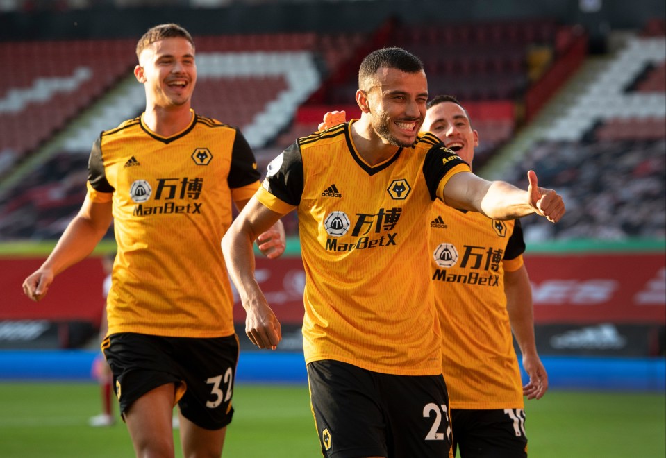 Romain Saiss celebrates his goal for Wolves