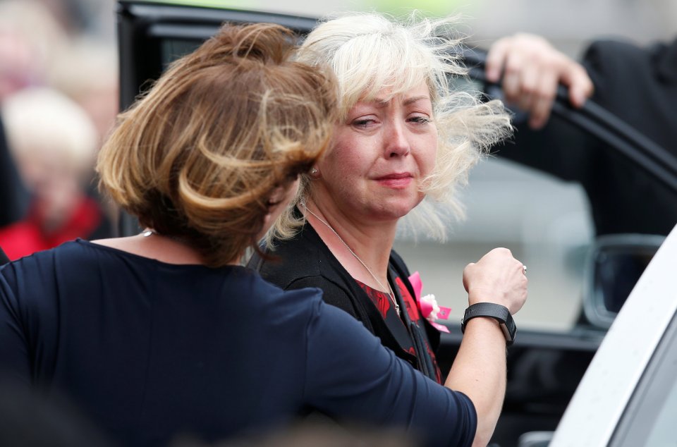 Tearful Lisa Roussos leaves her funeral at Manchester Cathedral on July 26, 2017