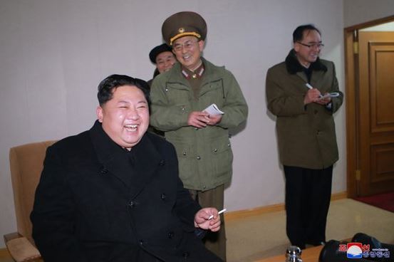 Kim Jong-un watches on as his new Hwasong-15 rocket takes flight during a test launch