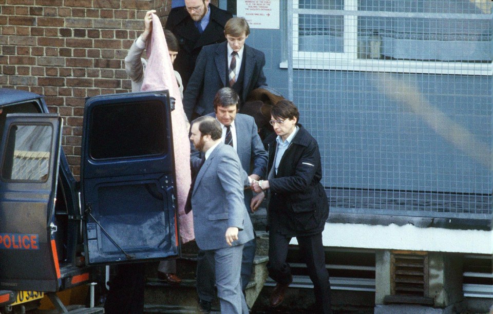 Dennis Nilsen on his way to court in handcuffs in February 1983