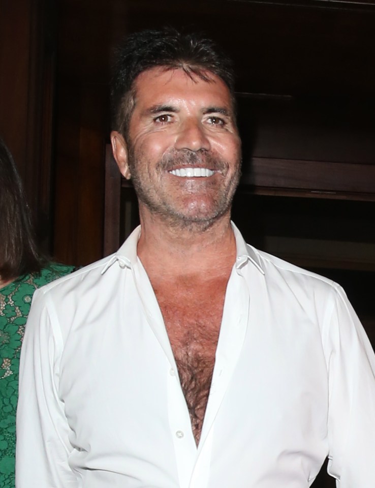 The X Factor judge loves a deep v-neck